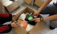Bandırma Belediyesi ihtiyaç sahiplerine binlerce koli yardımda bulundu
